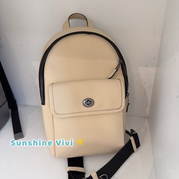 NWT Coach CAJ92 Turnlock Sling Pack In Smooth calf leather Ivory - Picture 1 of 7